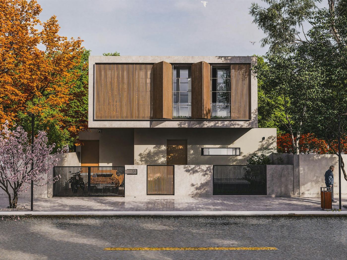 The Olive Renovation: a two-storey home with timber shutters above a stone base, behind a garden wall